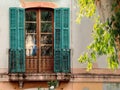A Spanish shuttered window with balcony Royalty Free Stock Photo