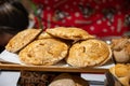 Spanish snacks and street food, baked pie empanadilla with different filling on market in San-Sebastian, Spain Royalty Free Stock Photo