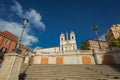 Spanish stairway in Rome on a butiful sunny day. Empty stairs in rome, close to piazza di spagna in central Rome. Blue skies and Royalty Free Stock Photo