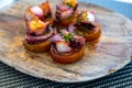 Spanish starter in fish restaurant in Getaria, grilled octopus with roasted potatoes and paprika, Basque Country, Spain