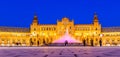 Spanish Steps and fountain lit in pink at night in Seville, Andalusia, Spain Royalty Free Stock Photo