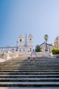 The Spanish Steps in Rome, Italy. The famous place is a great example of Roman Baroque Style. Italy couple on city trip