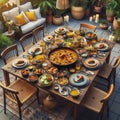 Spanish Style Outdoor Dining: Paella and Authentic Dishes on Wooden Table Royalty Free Stock Photo