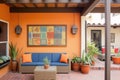 spanish style patio with terracotta floor and wall hangings