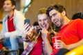 Spanish supporters watching football game and making selfie Royalty Free Stock Photo