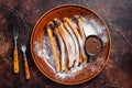 Spanish tapas churros with sugar and chocolate sauce. Dark background. Top view Royalty Free Stock Photo