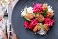 spanish tapas crispy fried chicken served with closeslaw and sesame dust