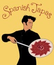 Spanish Tapas. Handsome Spanish chef holding a knife and showing a delicious dish of Iberian Ham.