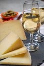 Spanish tapas, manchego cheese made, green olives served with glasses of dry fino sherry wine Royalty Free Stock Photo