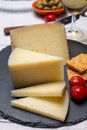 Spanish tapas, manchego cheese made, green olives served with glasses of dry fino sherry wine Royalty Free Stock Photo