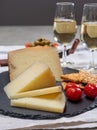 Spanish tapas, manchego cheese made, green olives served with glasses of dry fino sherry wine Royalty Free Stock Photo