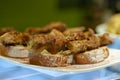 Spanish tapas. Pinchos morunos on bread. Montaditos Royalty Free Stock Photo