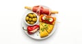 Spanish tapas platter with grissini wrapped in prosciutto, olives, and stuffed pepper Royalty Free Stock Photo