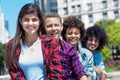 Spanish teen with group of multicultural young adults in a row Royalty Free Stock Photo