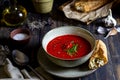 Spanish tomato soup gazpacho on a wooden background. Dark food photography Royalty Free Stock Photo