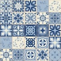 Spanish traditional blue ceramic symmetrical pattern square tiles for bathroom decoration Royalty Free Stock Photo