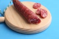 Spanish traditional chorizo sausage on a wooden cutting board