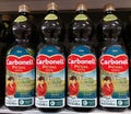 spanish virgen extra Carbonell olive oil bottles in a supermarket Royalty Free Stock Photo