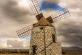 Spanish windmill made of stone with blue sky