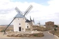 Picturesque Spanish windmills and Don Quichot statue in Consuegra,Spain Royalty Free Stock Photo