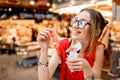Spanish woman eating jamon at the market Royalty Free Stock Photo