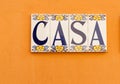 Spanish word CASA meaning house or home tiled on wall