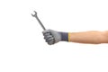 Hand holding a metal spanner on white background Royalty Free Stock Photo