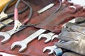 Spanners, Gloves And Tools On Machanic Table.