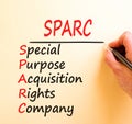 SPARC special purpose acquisition company symbol. Concept words SPARC special purpose acquisition company on white paper. Brown Royalty Free Stock Photo