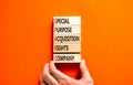 SPARC special purpose acquisition company symbol. Concept words SPARC special purpose acquisition company on wooden block. Orange Royalty Free Stock Photo