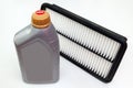 Spare part for car engine air filter for cleaning dust and dirt with bottle on a white isolated background. Maintenance and oil Royalty Free Stock Photo