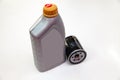 Spare part for car engine filter for cleaning dust and dirt with one liter bottle or can of lubricant on a white isolated