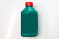 Spare part for car stop system brake fluid one liter bottle in green color with red cap on a white isolated background. Royalty Free Stock Photo