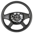 Spare part and interior element of a car steering wheel with leather trim and buttons with airbag on a white isolated background.