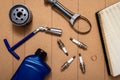 Spare parts for car and tools on wooden table Royalty Free Stock Photo