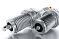 Spare parts spark plugs on white background for car and motorcycle Royalty Free Stock Photo