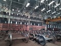 Spare railway wheels on the axle in a repair workshop