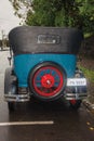 Spare tire in the back of antique Ford 1929 car