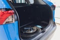 Spare tire in the trunk of a modern car. Royalty Free Stock Photo