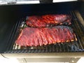 Pork Spareribs on a Pellet Smoker Royalty Free Stock Photo