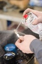 Spark plug cleaning. Royalty Free Stock Photo