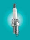 Spark plug isolated on blue turquoise background Royalty Free Stock Photo