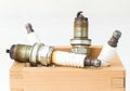 Spark plug in wood box Royalty Free Stock Photo