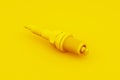 Spark plugs isolated on yellow background. 3D illustration Royalty Free Stock Photo