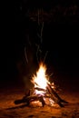 Sparking Camp Fire in the Night Royalty Free Stock Photo