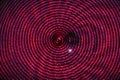 Sparkle in a a red spiral background Royalty Free Stock Photo