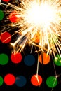 Sparkler background. A sparkler is a type of hand held firework that burns slowly while emitting colored flames, sparks Royalty Free Stock Photo