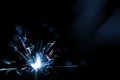 Sparkler in blue and white light on a black background Royalty Free Stock Photo