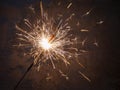 Sparkler candle lights. Bright sparks, fireworks fireworks. Concept of holiday, joy, New year, Christmas, birthday Royalty Free Stock Photo
