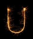 Sparkler firework light alphabet U (Capital Letters) at night Royalty Free Stock Photo